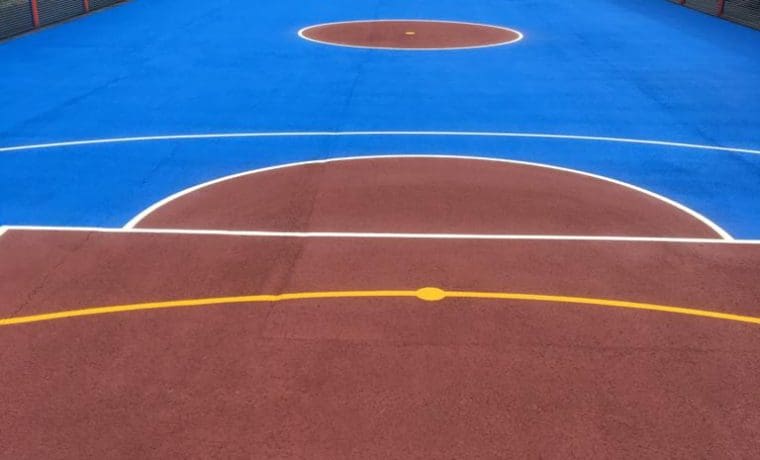 Two tone colour coated MUGA, basketball line marking, 5 a side football line marking in Swansea