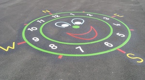 Smiley Clock Face With Compass playground markings in RCT