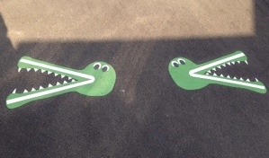 More Less Than Crocodiles playground markings in Caerphilly