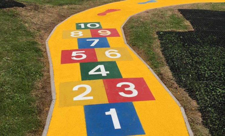 Bespoke Coloured paths and hopscotch playground markings in parks