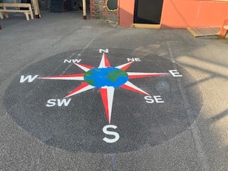 8 point compass with globe installed in schools in RCT